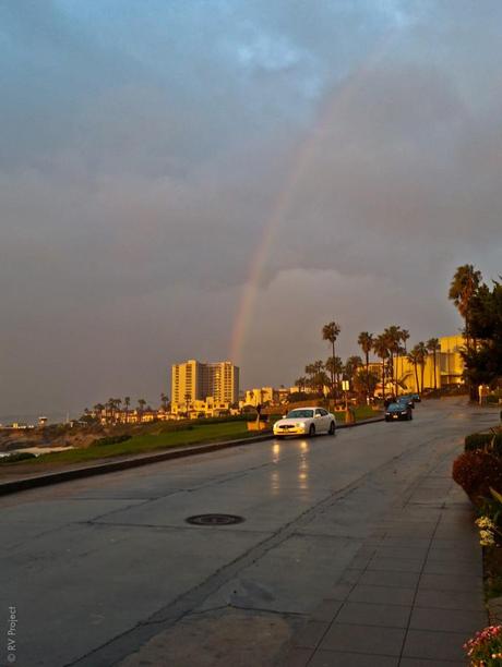 Yep, that's a rainbow coming out of the building my parents reside in. Photo by my father.