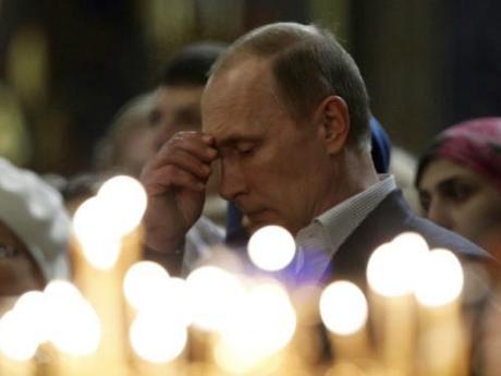 Putin praying