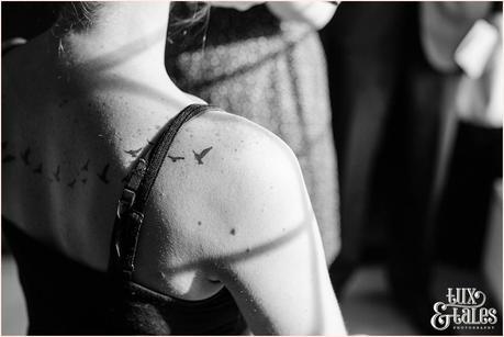 Bird tattoo on shoulder of bride at Hogarths Hotel Wedding