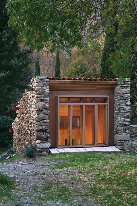 Modern cabin renovation with glass facade