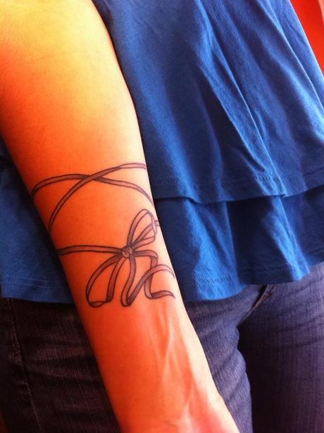 Ribbon Tattoo Design meaning