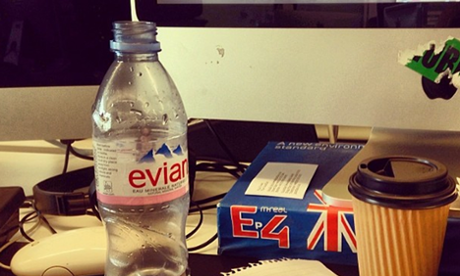 Evian bottle on desk