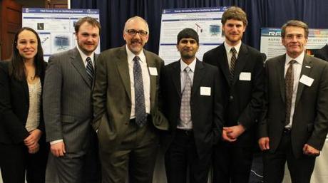 The hydrofoil team presents findings in Washington, D.C. From left: Jennifer Franck, lecturer in engineering; Michael James Miller, grad student; Kenneth Breuer, professor of engineering; Shreyas Mandre, professor of engineering and team leader; Benjamin Strom, research engineer; and Bryan Willson, a program director at the Advanced Research Projects Agency-Energy (ARPA-E).