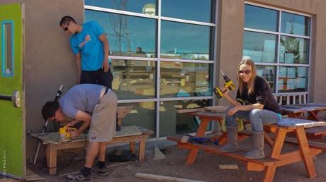 Repairing the back of the camper shell with my lovely cousin, Olga, and her good friend, James. Lifesavers!