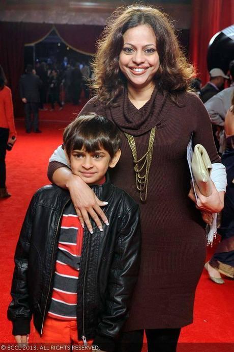 Actor R Madhavans wife Sarita Birje with son Vedant Madhavan walks the red carpet at the Times of India Film Awards held in Vancouver Canada R Madhavans son Vedant