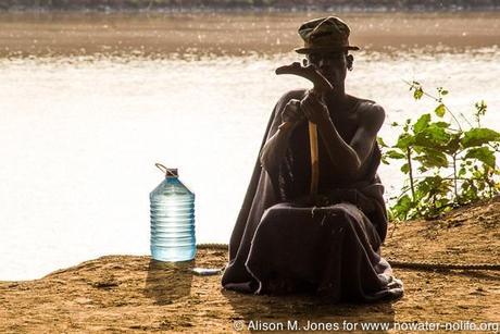 A Dassenech tribal elder on Ethiopia's Omo River, perhaps pondering the gift of water and the hours women spent collecting it for his village.