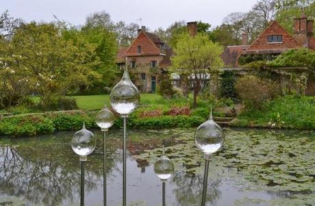 Glass baubles on the edge of the lake at Vann, near Godalming Surrey. Taken - May 2012