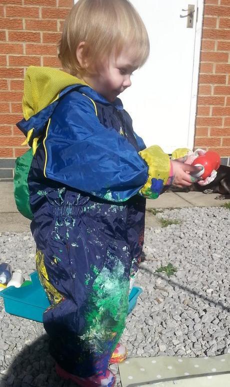 Little Miss A gets really messy with outdoor painting!