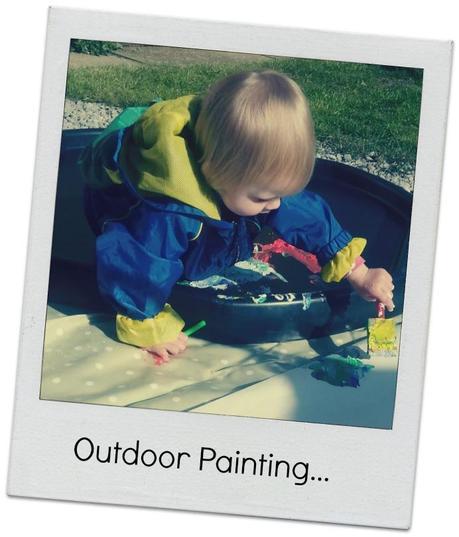 Little Miss A gets really messy with outdoor painting!