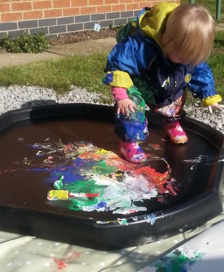 Little Miss A gets really messy with outdoor painting!