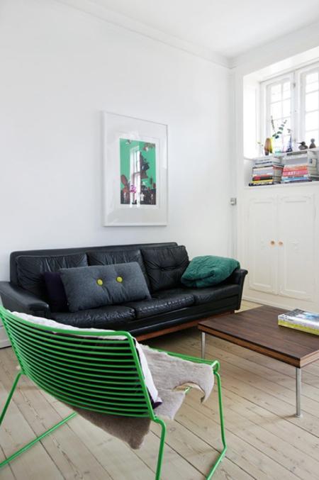 black-leather-sofa-green-chair
