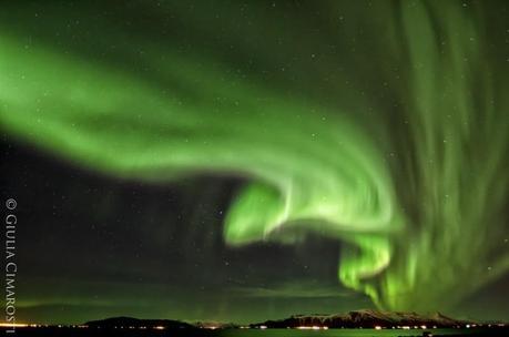 Green - the Northern Lights over Reykjavik, Iceland