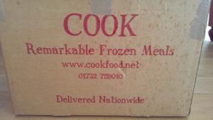 A bundle of frozen meals from COOK