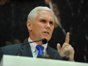 Gov. Mike Pence (R) expanded gun rights in Indiana this week by signing SB229 into law (Photo Credit: Indiana Courier Journal)