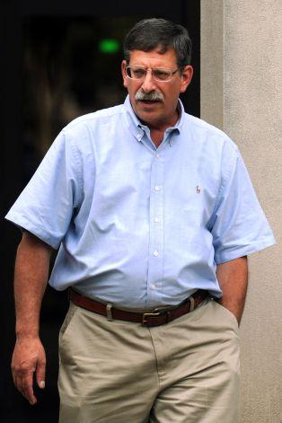 David Laguercia leaves the Federal Courthouse, in Bridgeport, Conn., after pleading guilty to technical violations to federal firearms laws. Laguercia is the owner of Riverview Sales, a gun store in East Windsor where Nancy Lanza bought the semiautomatic rifle that her son, Adam, used at Sandy Hook Elementary School last December. Photo: Ned Gerard / Connecticut Post