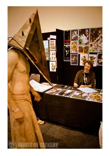 Silent Hill artist T-Rex Jones meets Pyramid Head. 