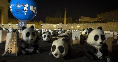 Models of pandas form part of an environmental protest near St Peter’s Basilica in the Vatican City. Its lights were turned off for 60 minutes on Saturday to raise awareness of the danger of global climatic change. Photograph: EPA/Angelo Carconi