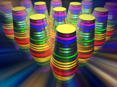 The image shows a “multilayered waveguide taper array.” The different wavelengths, or colors, are absorbed by the waveguide tapers (thimble-shaped structures) that together form an array