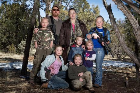 Brian and Sheila Moffatt with their children at their home on Feb. 23, 2013, in Overgaard, Ariz.