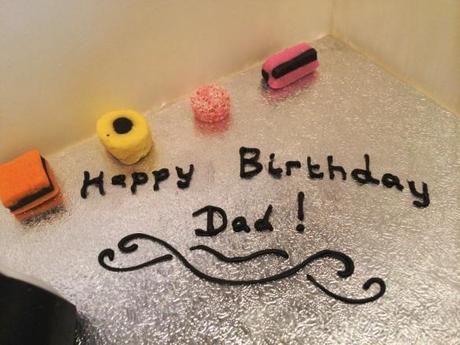 happy birthday dad hand piped icing liqourice allsorts cake board
