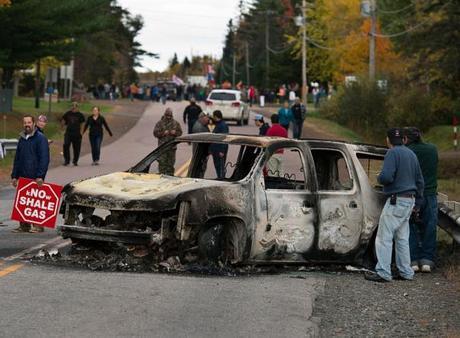 Burnt RCMP vehicle after Oct 17, 2013, raid.