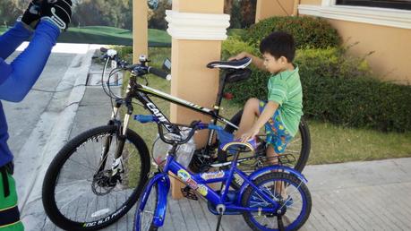 Father and son bonding time: Biking under the sun