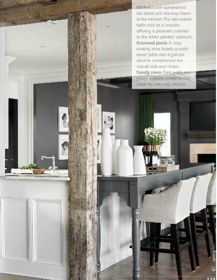 Rustic modern kitchen. gray + white + linen. Love the idea to extend kitchen counter to make a breakfast bar by adding a table pushed up to the counter.  And those bar stools actually look comfortable.