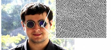 UC Irvine undergraduate chemistry student George Auwaijan sporting a pair of sunglasses coated with a new material invented by researchers there that mimics the pattern of moth eyeballs to reduce glare