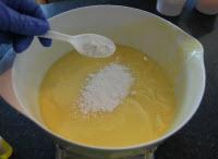 Hot Soap adding titanium dioxide to the soap batter