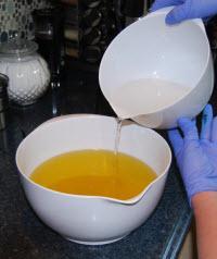Hot Soap adding the lye solution to the soap ingredients
