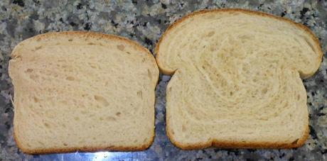 You can see how dense the first batch is when you compare slices.  These are slices from the middle of the loaves.  The one on the left is my first batch.  The one on the right is my second batch.