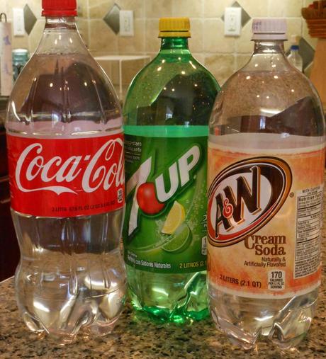 Soda bottles re-purposed as water storage.
