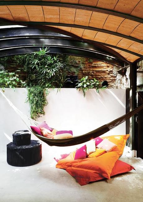 Outdoor area with hammock and barrel ceiling