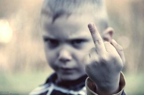 This precocious young punk is already society and everyone who is a part of it a massive middle finger! Good start boy! You have a great life ahead of you!