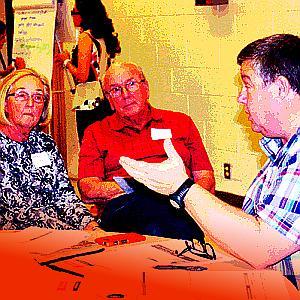 PMC Consultant Mark Teague, right, led a group discussion about what Morongo Basin citizens would tolerate in the way of utility-scale energy projects during an Apr. 17 workshop - courtesy Rebecca Unger, The Desert Trail