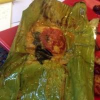 Banana leaf wrapped grill fish