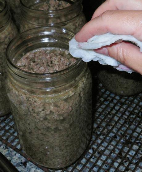 Next, I used a damp paper towel to clean the top of the jar to ensure nothing would prevent a good seal.