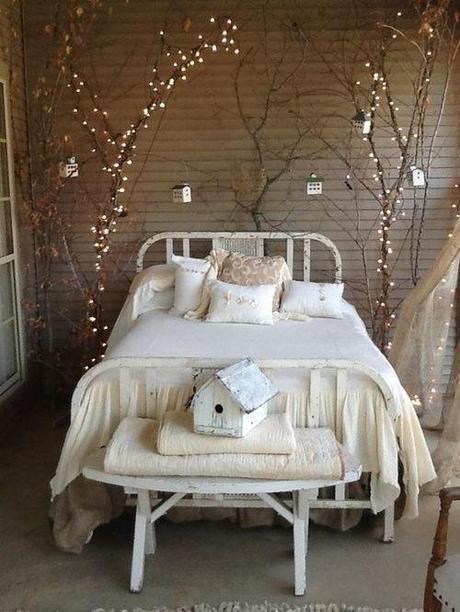 all white vintage bedroom with fairy lights