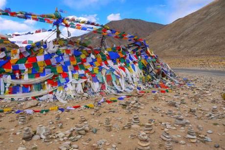 The prayer flag strewn pass before descending to the lakes.