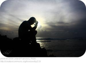 Man Praying Near Water