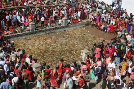 Gathering around the Mata Tirtha pond