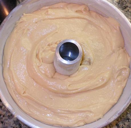 I put the remaining cake batter into the pan, directly on top of the first layer of the cinnamon creme mixture.