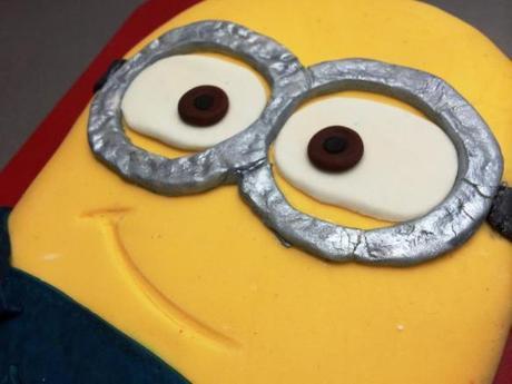 minion from despicable me birthday cake face and cheeky smile silver