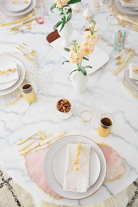 Gold And Blush Table Setting On Marble