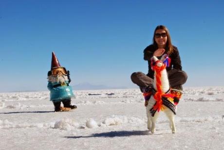 Angie riding her llama to work in Uyuni