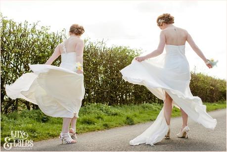 Two brides spinning in the streets same sex wedding photography York