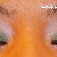 Face Of The Day: Green & Purple