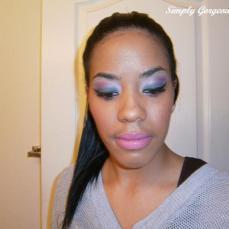 Face Of The Day: Green & Purple