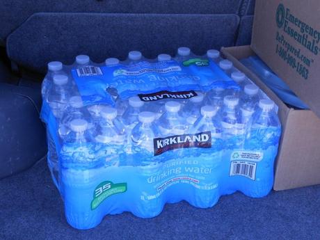 You can buy a couple cases of bottled water to have on hand.  Stick it under your bed.