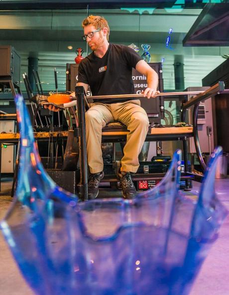 Gaffer at work blowing Glass